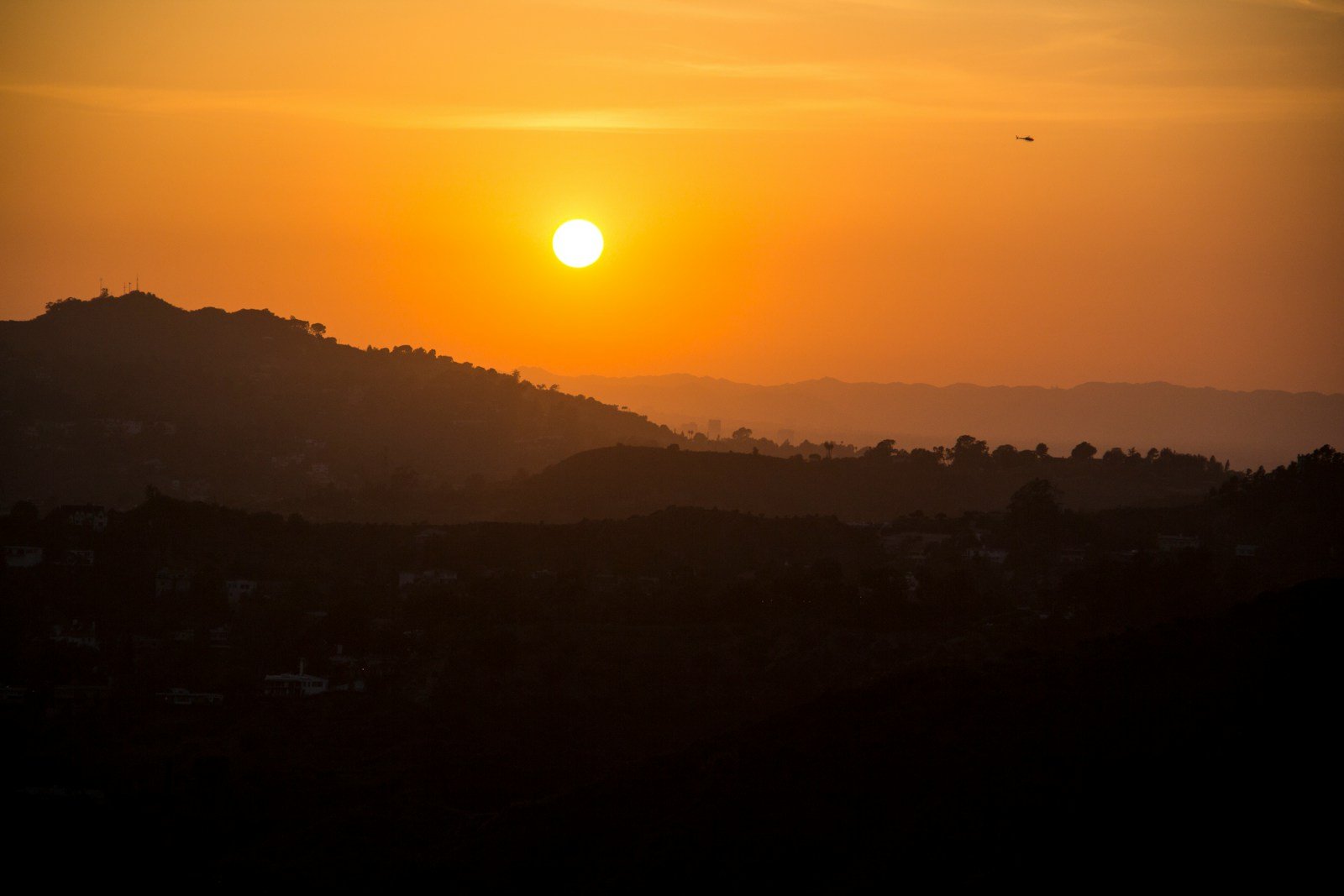 silhouette of mountains during sunset